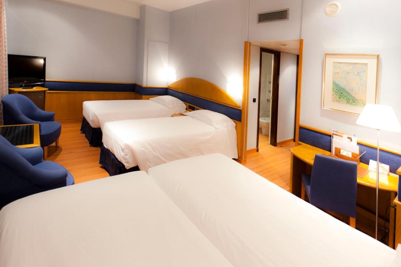Agumar Hotel Madrid Exterior photo Room at the hotel