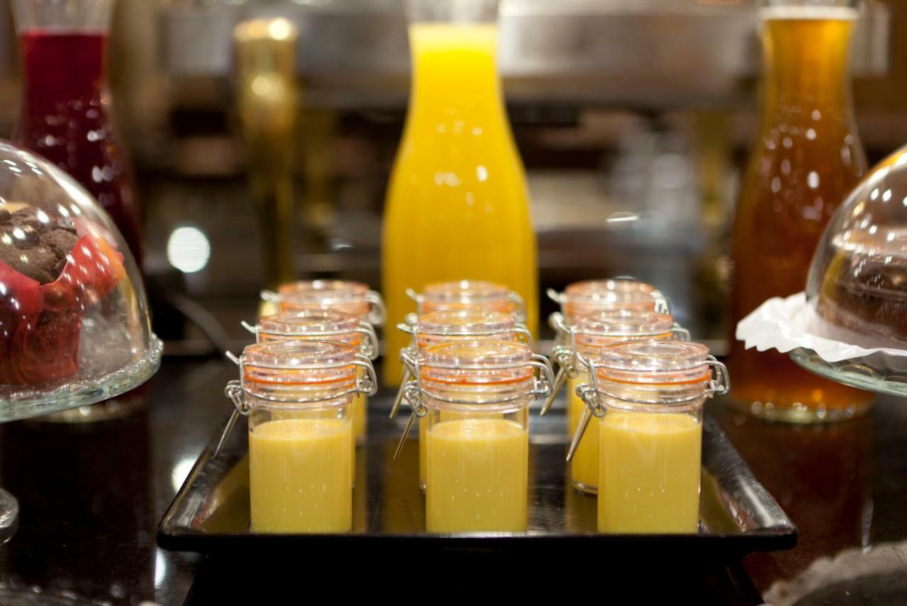 Agumar Hotel Madrid Exterior photo Orange juice